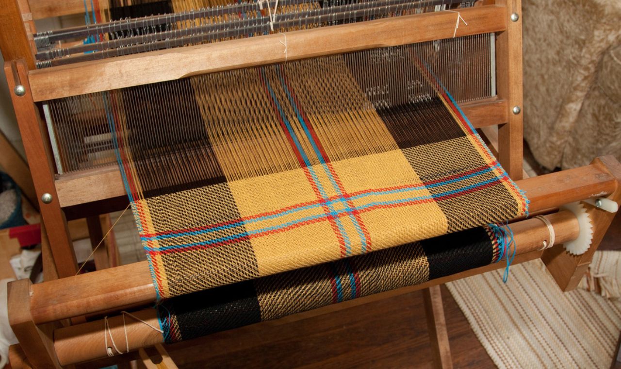 Clan Tartan Weaving: Threads of Scottish Identity